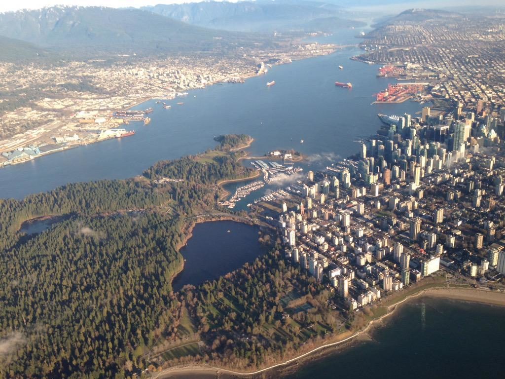 Aerial view of Stanley Park and Downtown Vancouver.