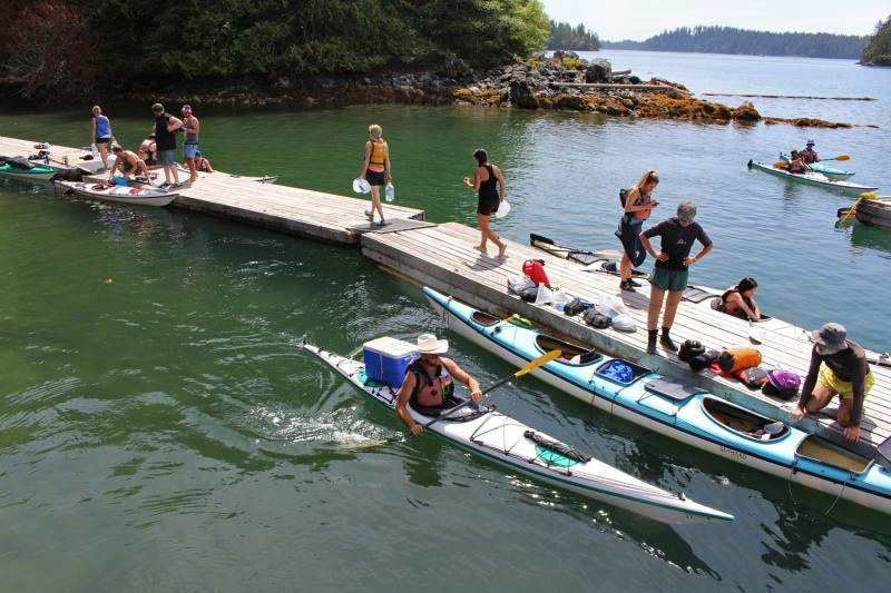 A long floating wharf acts as a debarking point for kayakers.
