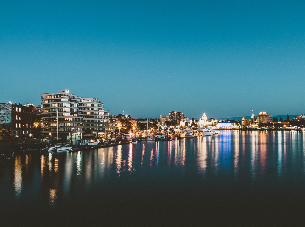 The Victoria skyline is aglow at night.