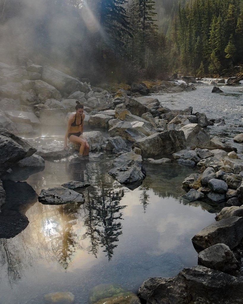 Taking a dip in steamy Lussier Hot Springs. Photo: @davidvassiliev via Instagram