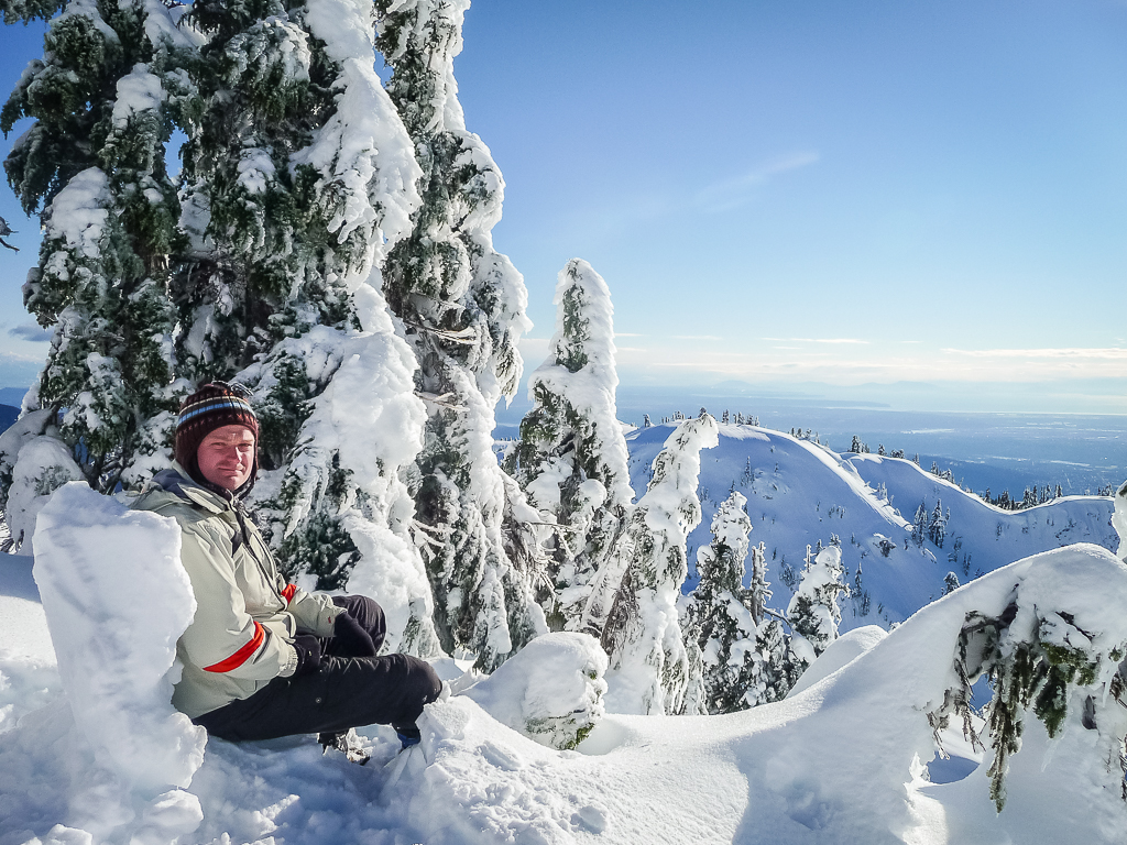 Having lunch amongst the trees and snow near the summit of Mount Seymour.