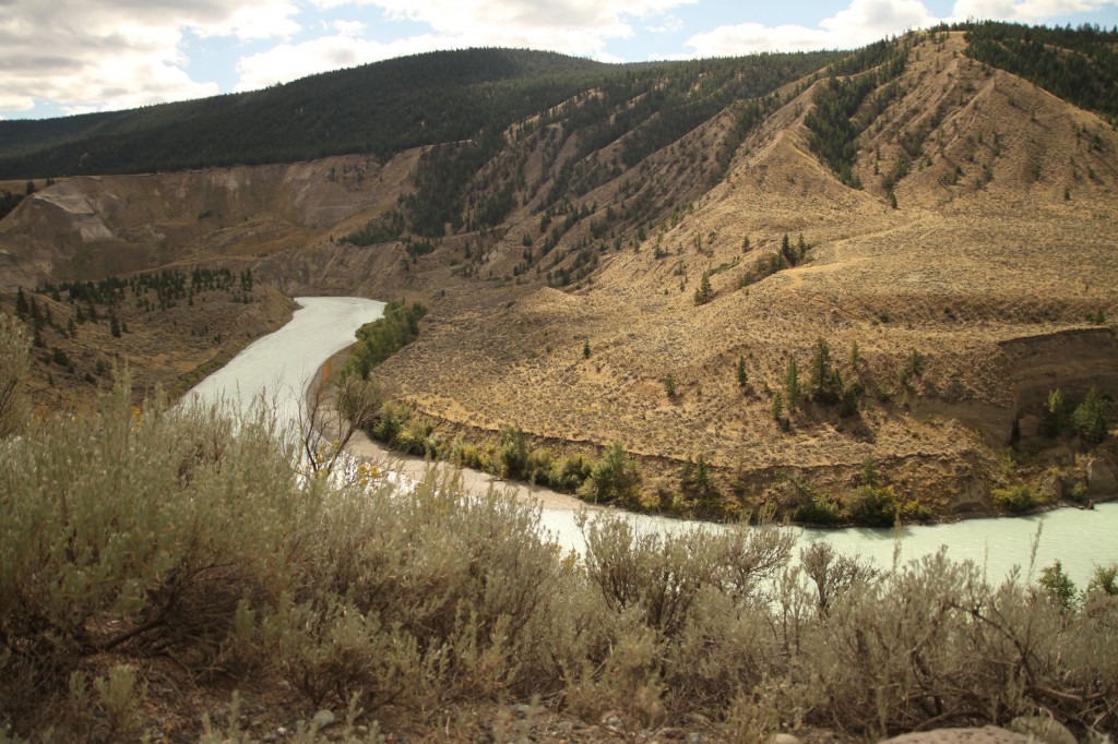 A river winds through a mountainous landscape.