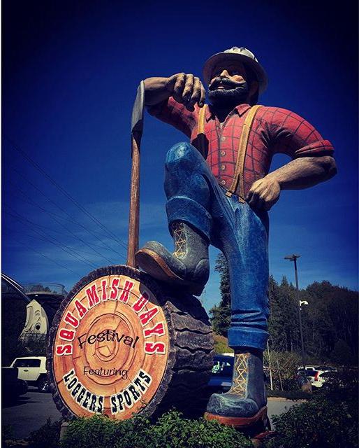 A statue depicting a giant lumberjack.