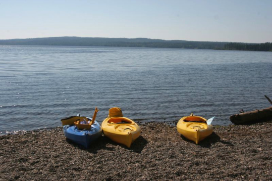Kayaks on the shore of West Lake.