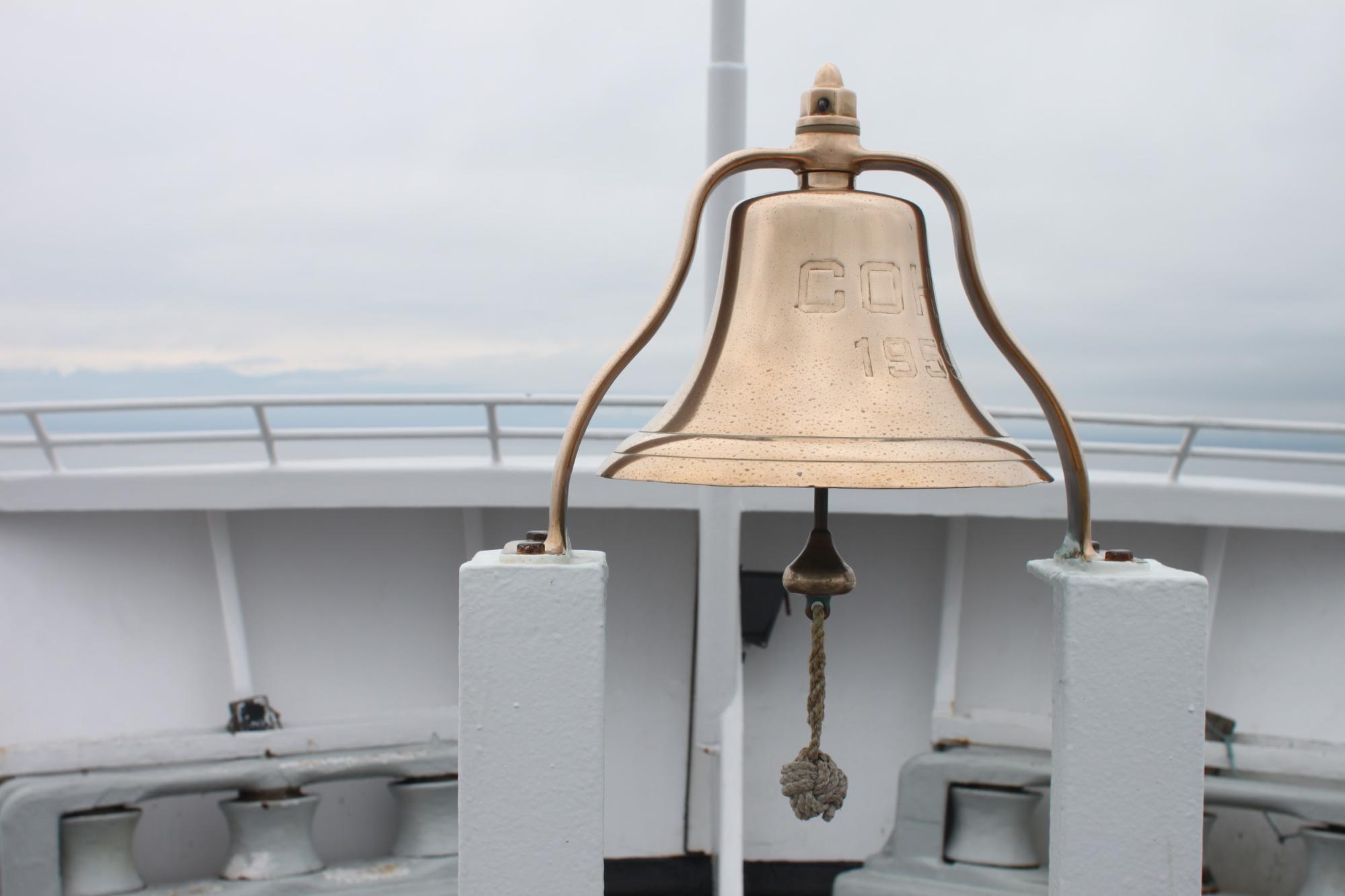 A brassy bell on the deck of the Black Ball Coho ferry.