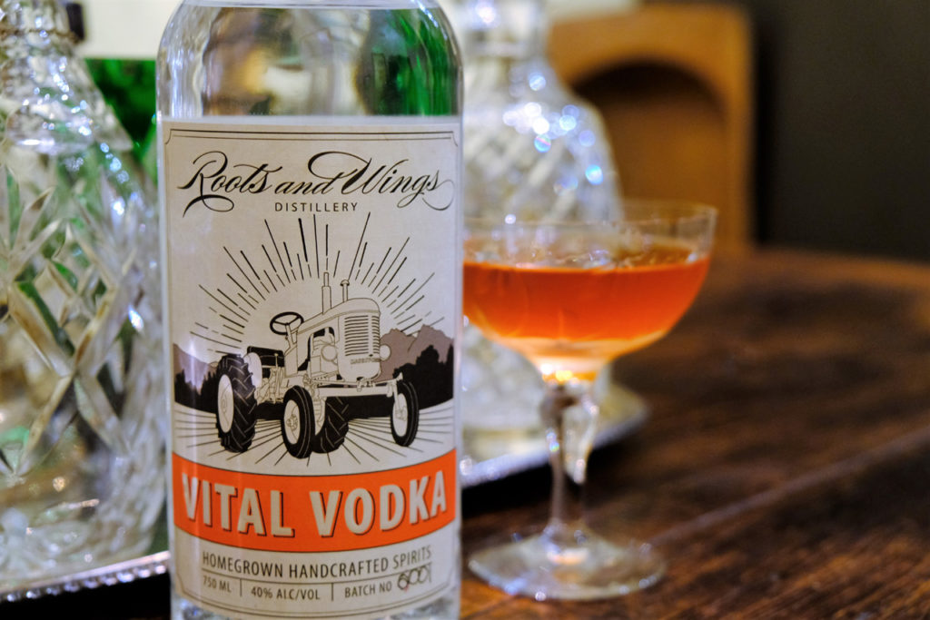 A bottle of small batch vodka from the Roots and Wings Distillery.