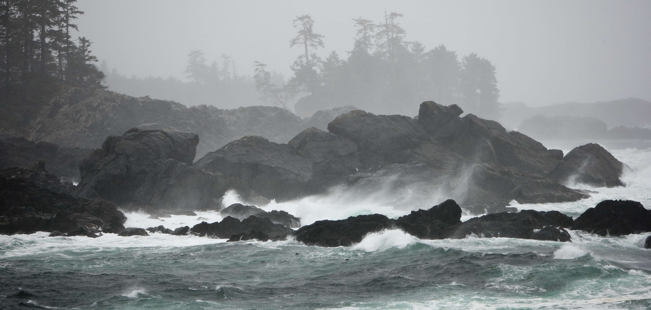 Storm waves crash on a beach on Vancouver Island