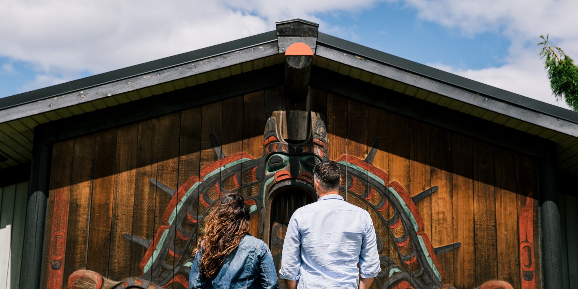 Couple standing in front of the I-Hos Gallery in Comox | Comox Valley/Jordan Dyck