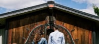 Couple standing in front of the I-Hos Gallery in Comox | Comox Valley/Jordan Dyck