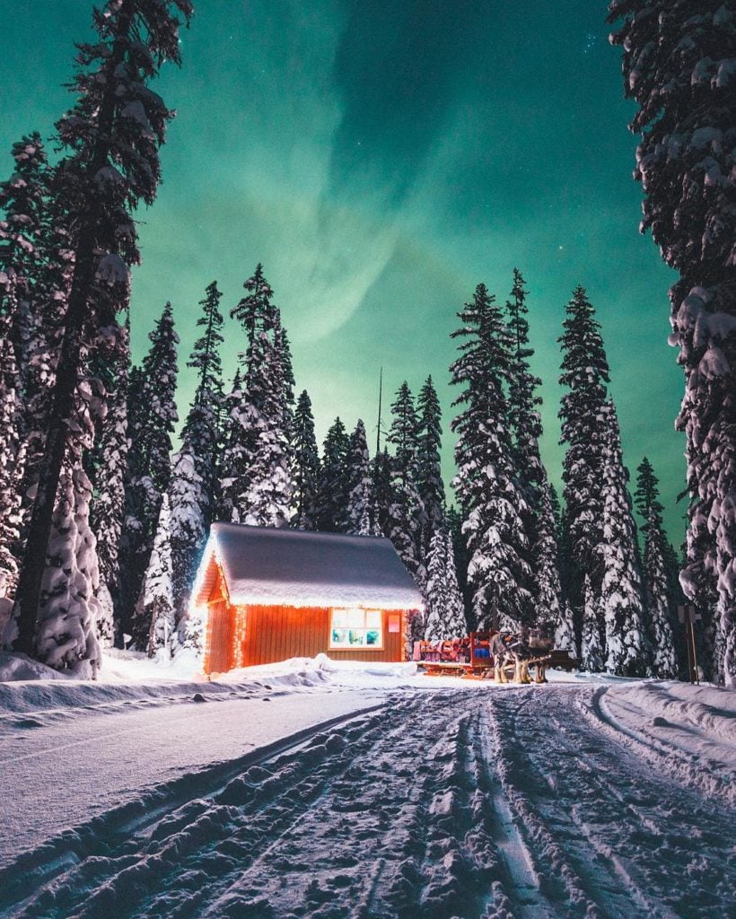 Arriving to a cabin at Big White Ski Resort by sleigh. 