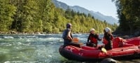 A group of friends river rafting on Vedder River | Hubert Kang