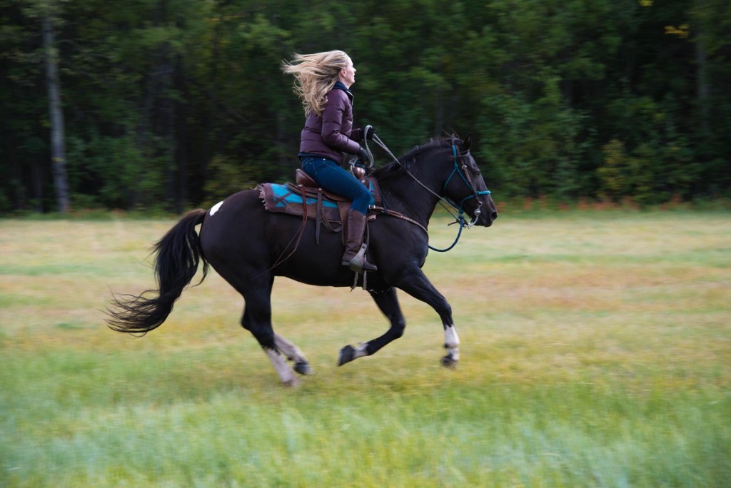 Tiffany on horseback in the Chilcotin grasslands. Photo: Geoff Moore