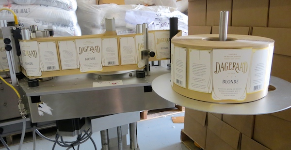 Labels ready to go on bottles at Dageraad Brewing in Burnaby.
