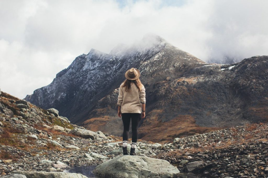 A women gazes up at the mountain view at Babine Mountains Provincial Park