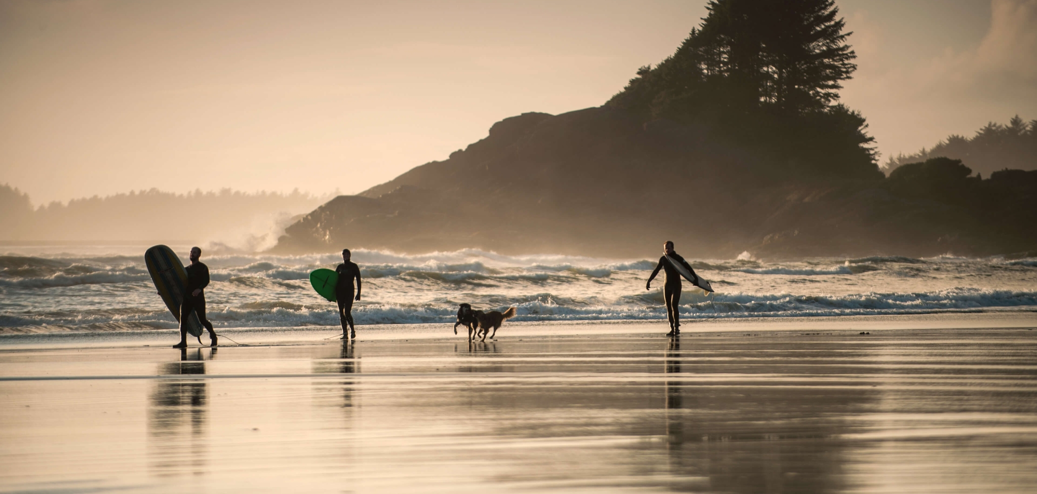 Surfers at Cox Bay on Vancouver Island