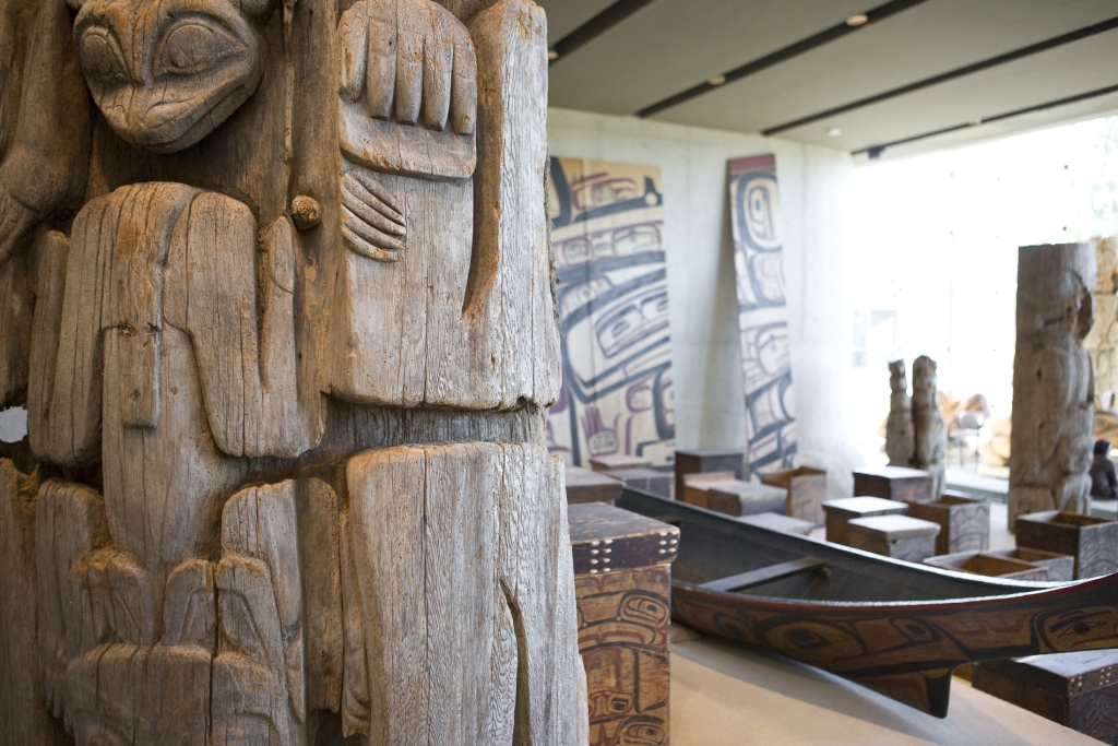Close up of a totem pole and other Indigenous Art work at the Museum of Anthropology. 