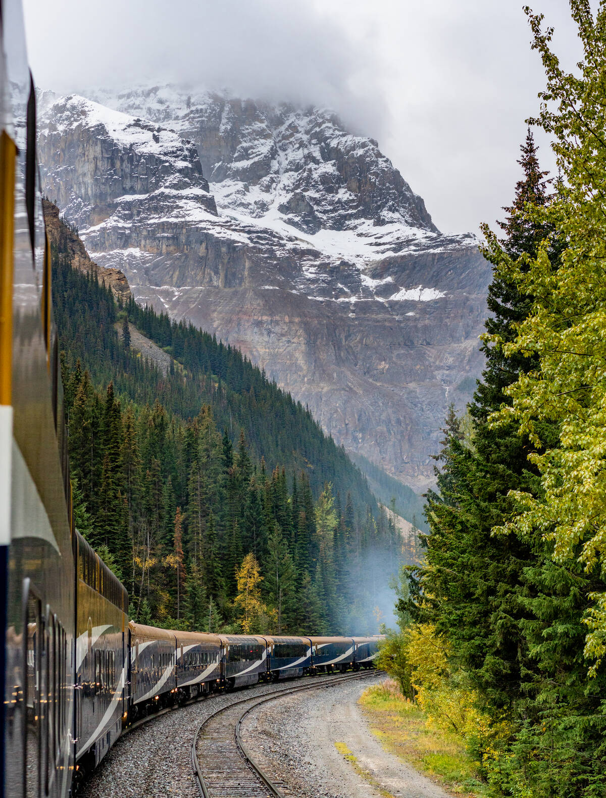 Rocky Mountaineer train rounding a corner through the mountain pass