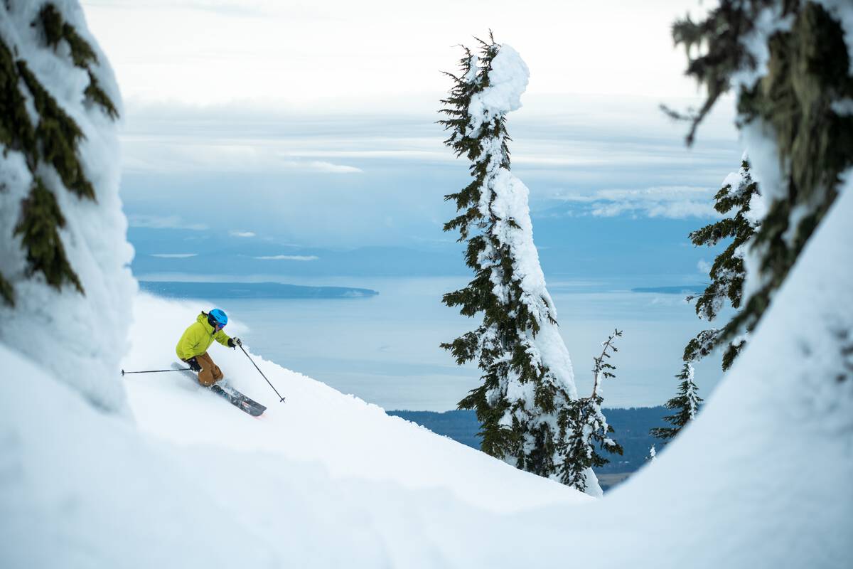 Skiing at Mount Washington Alpine Resort with views to the ocean
