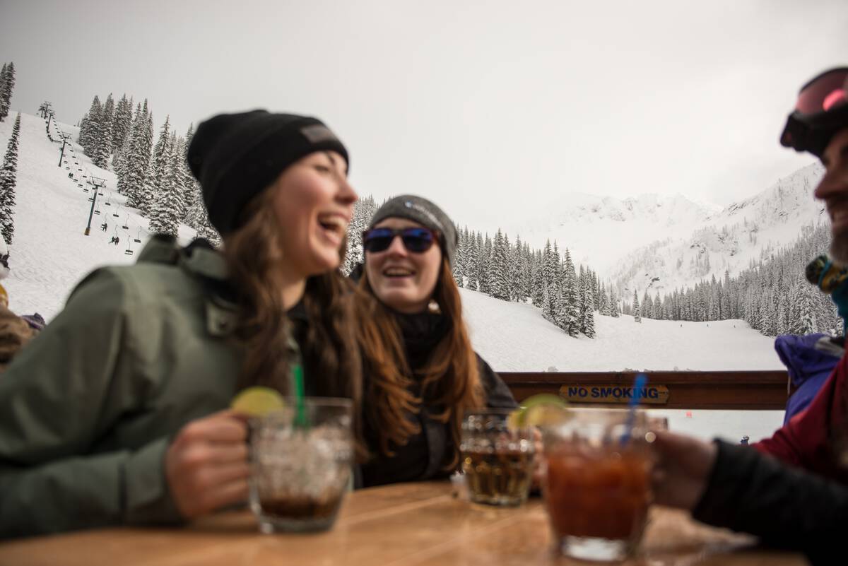 Apres skiing drinks on an outdoor patio at Whitewater Ski Resort.