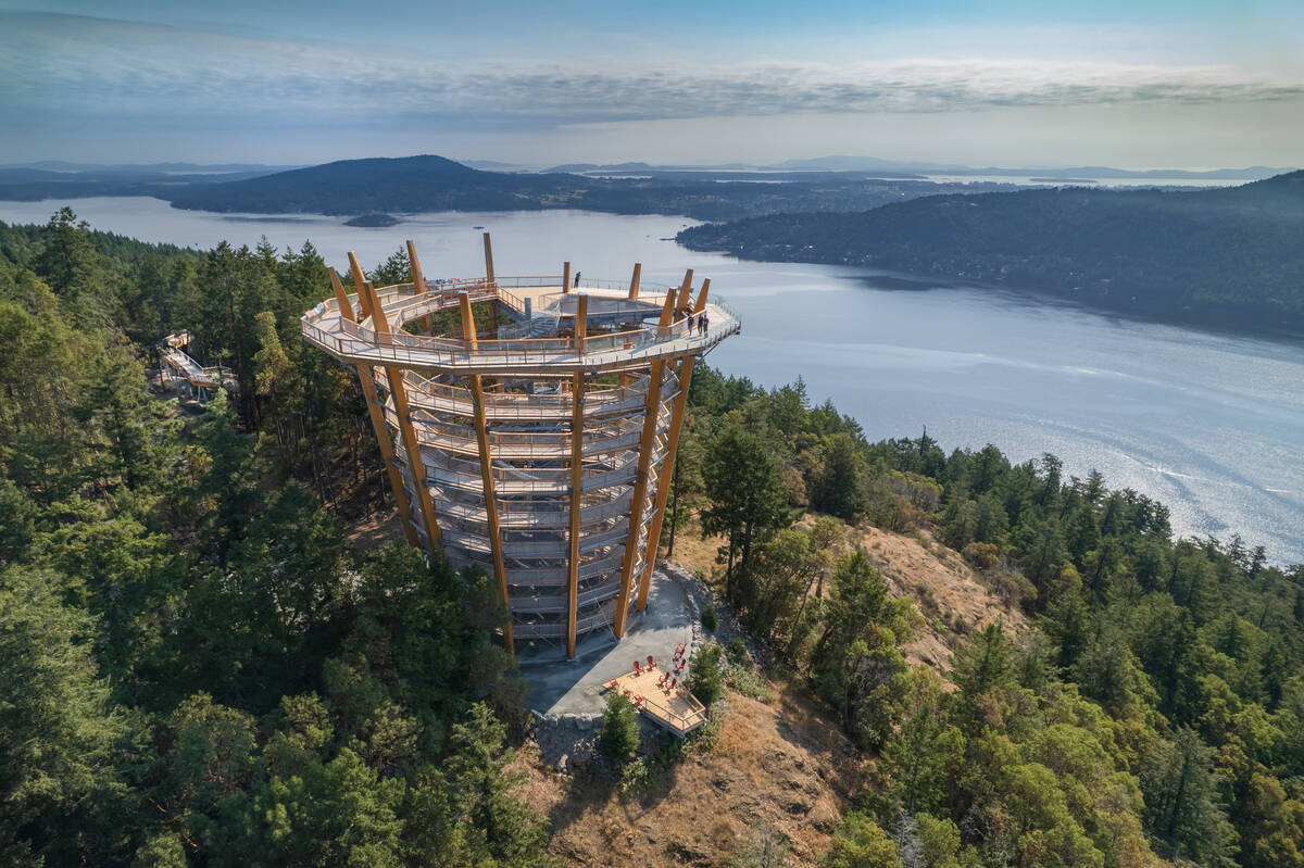 A spiralling walkway that gets wider as it gets taller overlooks the Salish Sea.